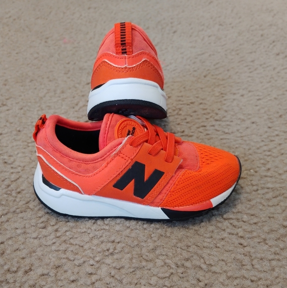 bright orange new balance